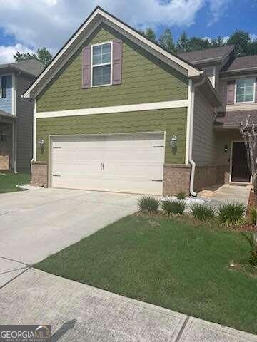 2496 Oakleaf Ridge, Unit 50 Lithonia, GA 30058 - Photo 1 of 1 a front view of a house
