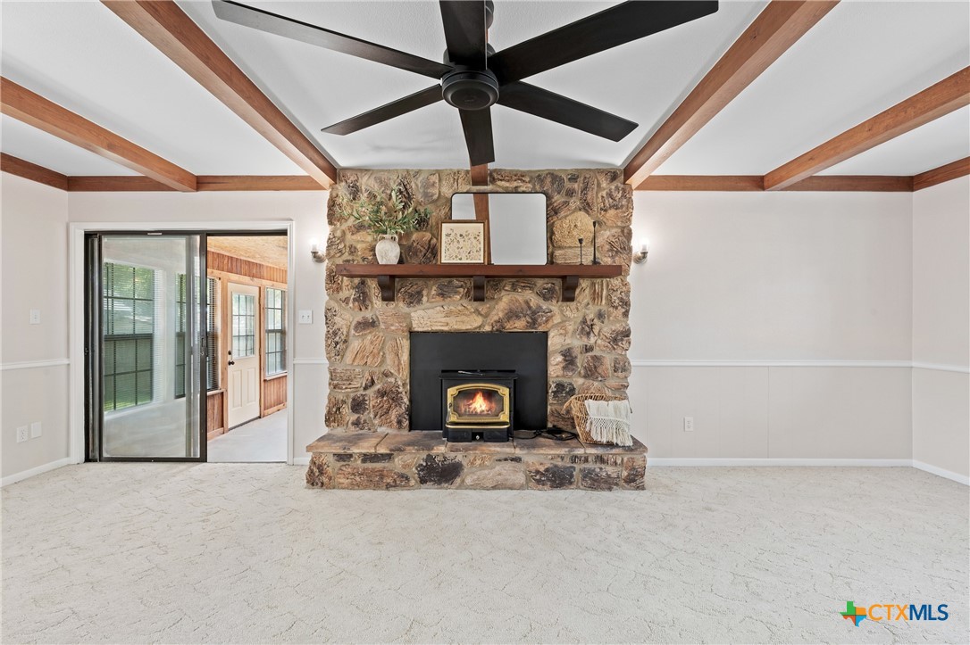 1903 North Harding Avenue Cameron, TX 76520 - Photo 12 of 44 a living room with a fireplace furniture and a fireplace