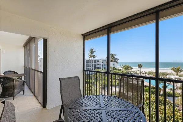 a view of a balcony with chair