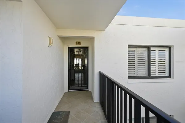 a view of a hallway with windows