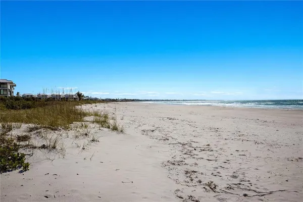 a view of beach and ocean
