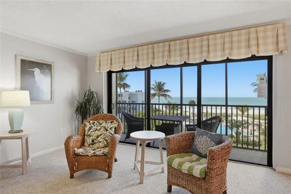 a balcony with furniture and a couch