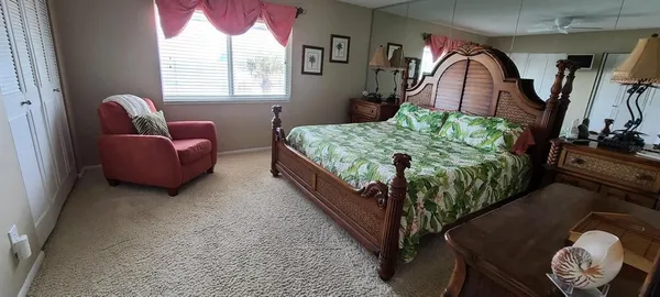 a bed room with a bed and a couch