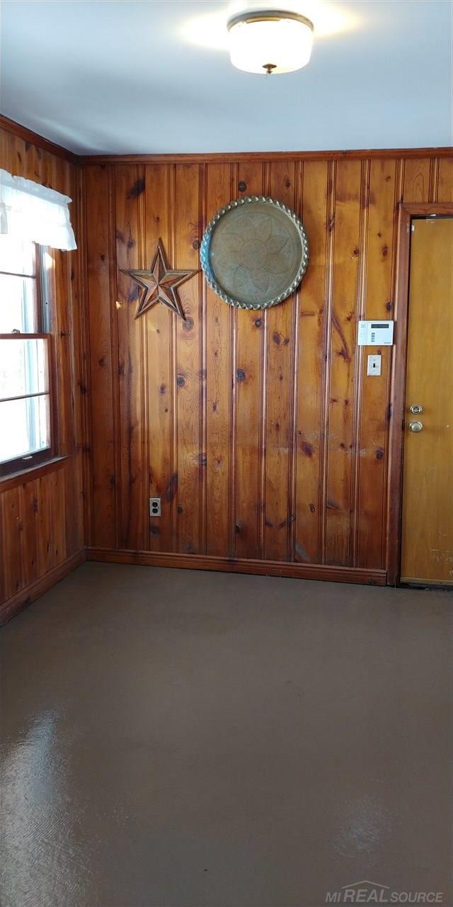 30521 Utica Road Roseville, MI 48066 - Photo 17 of 19 Connecting the main house to the extra large garage, this is the perfect space for a quiet sunny reading retreat, or possibly a great spot to start your day with some energizing exercise!