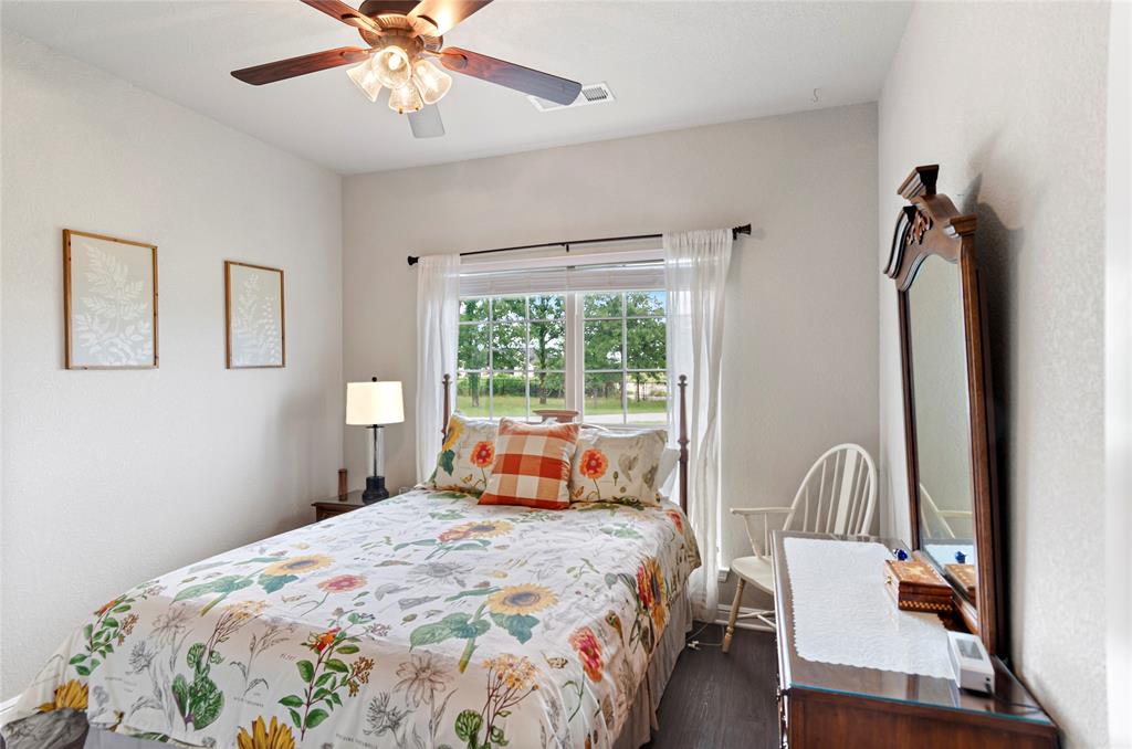 6093 Farm To Market Road 730 North Decatur, TX 76234 - Photo 14 of 28 a bedroom with a bed and a window