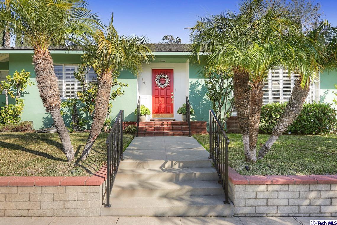 841 West Roses Road San Gabriel, CA 91775 - Photo 1 of 24 a front view of a house with garden