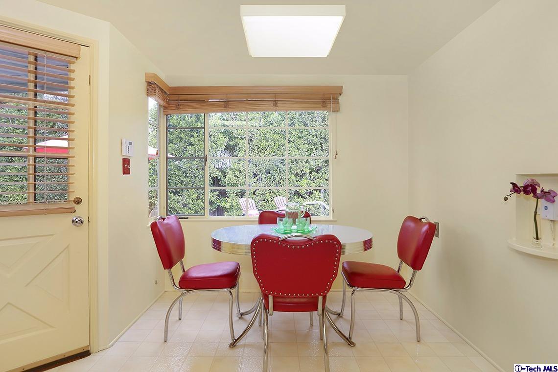 841 West Roses Road San Gabriel, CA 91775 - Photo 12 of 24 a dining room with furniture and a window
