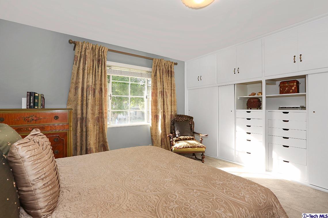 841 West Roses Road San Gabriel, CA 91775 - Photo 17 of 24 a bedroom with a bed and a window