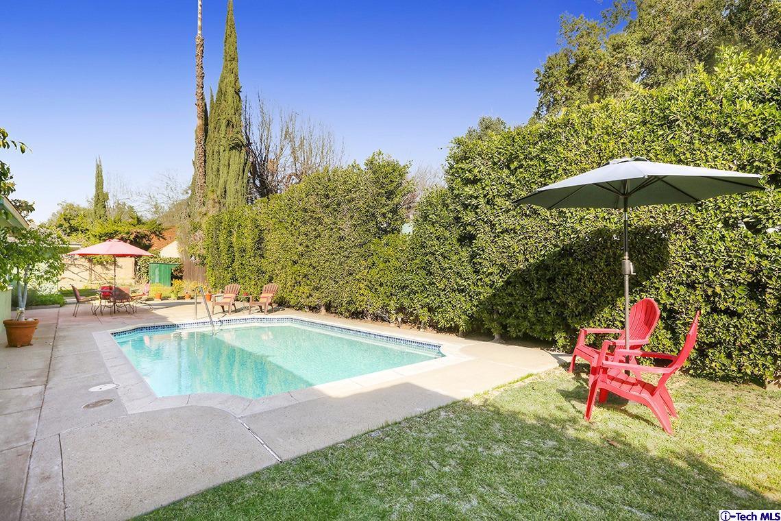 841 West Roses Road San Gabriel, CA 91775 - Photo 22 of 24 a swimming pool with outdoor seating yard and trees