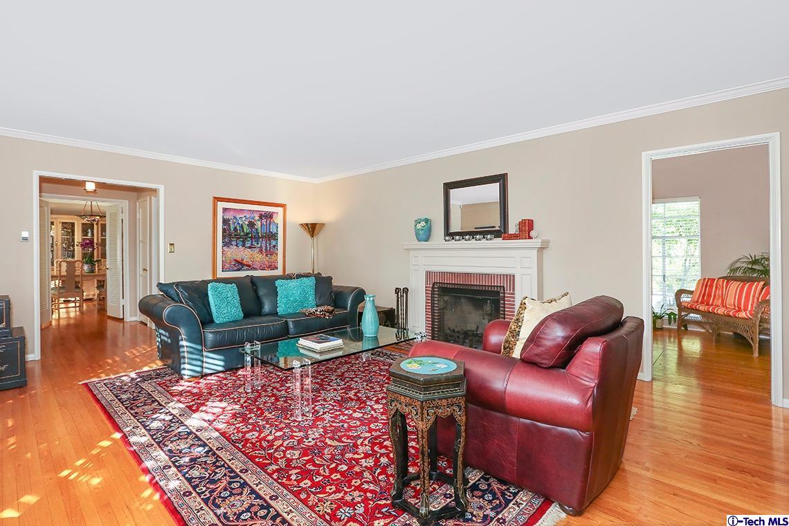841 West Roses Road San Gabriel, CA 91775 - Photo 4 of 24 a living room with furniture and a fireplace