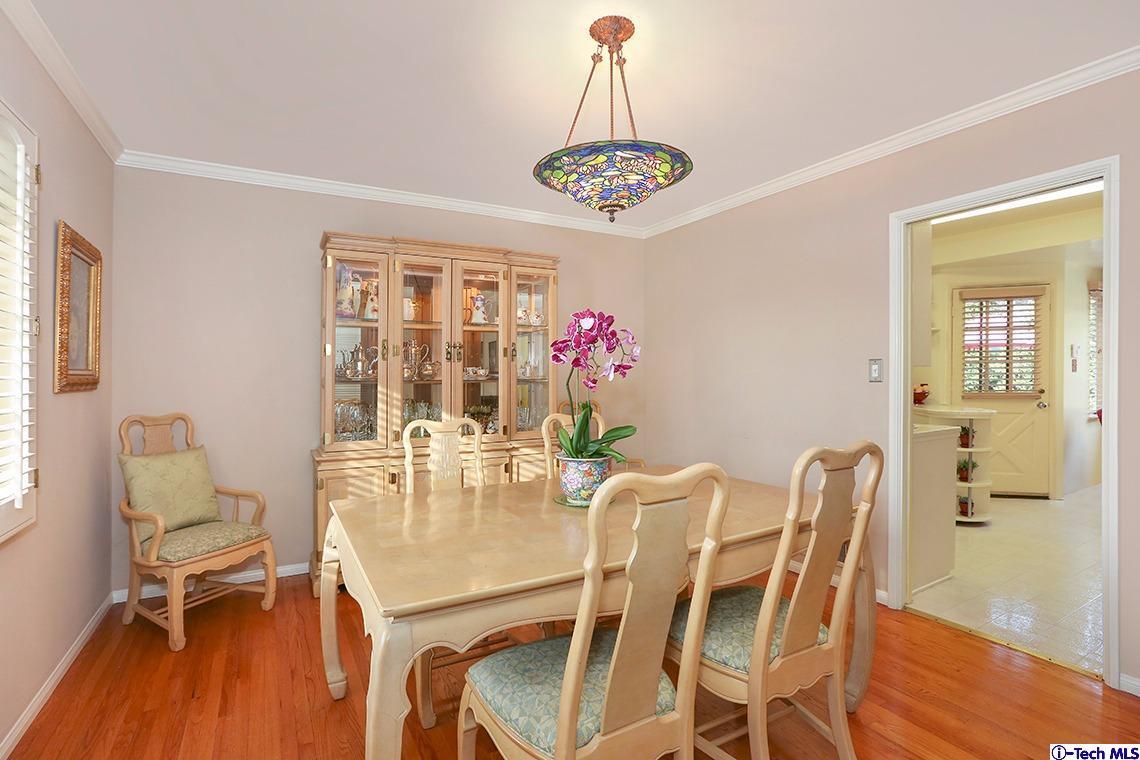 841 West Roses Road San Gabriel, CA 91775 - Photo 8 of 24 a view of a dining room with furniture window and wooden floor