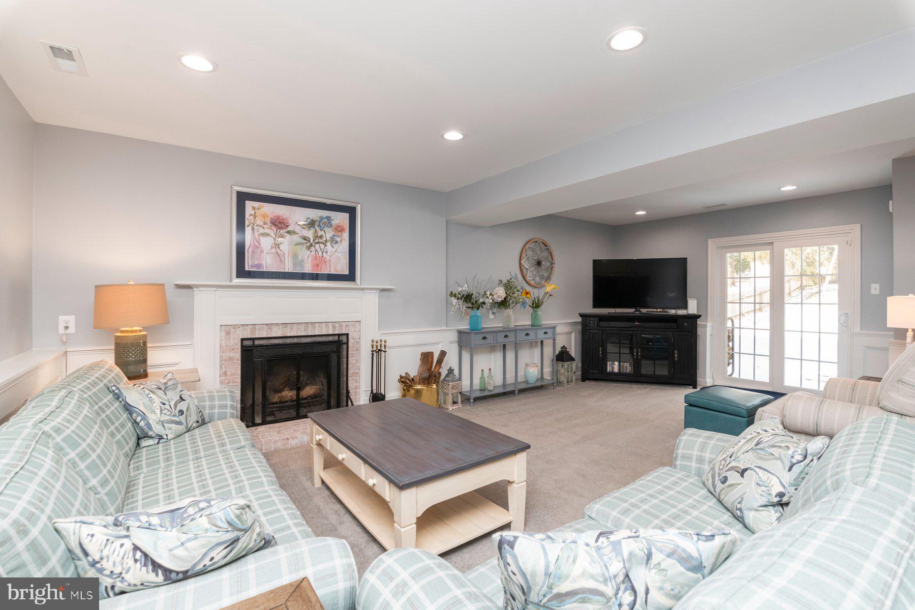 9078 Waltham Woods Road Baltimore, MD 21234 - Photo 21 of 38 Lower level - family room, fireplace, outside door