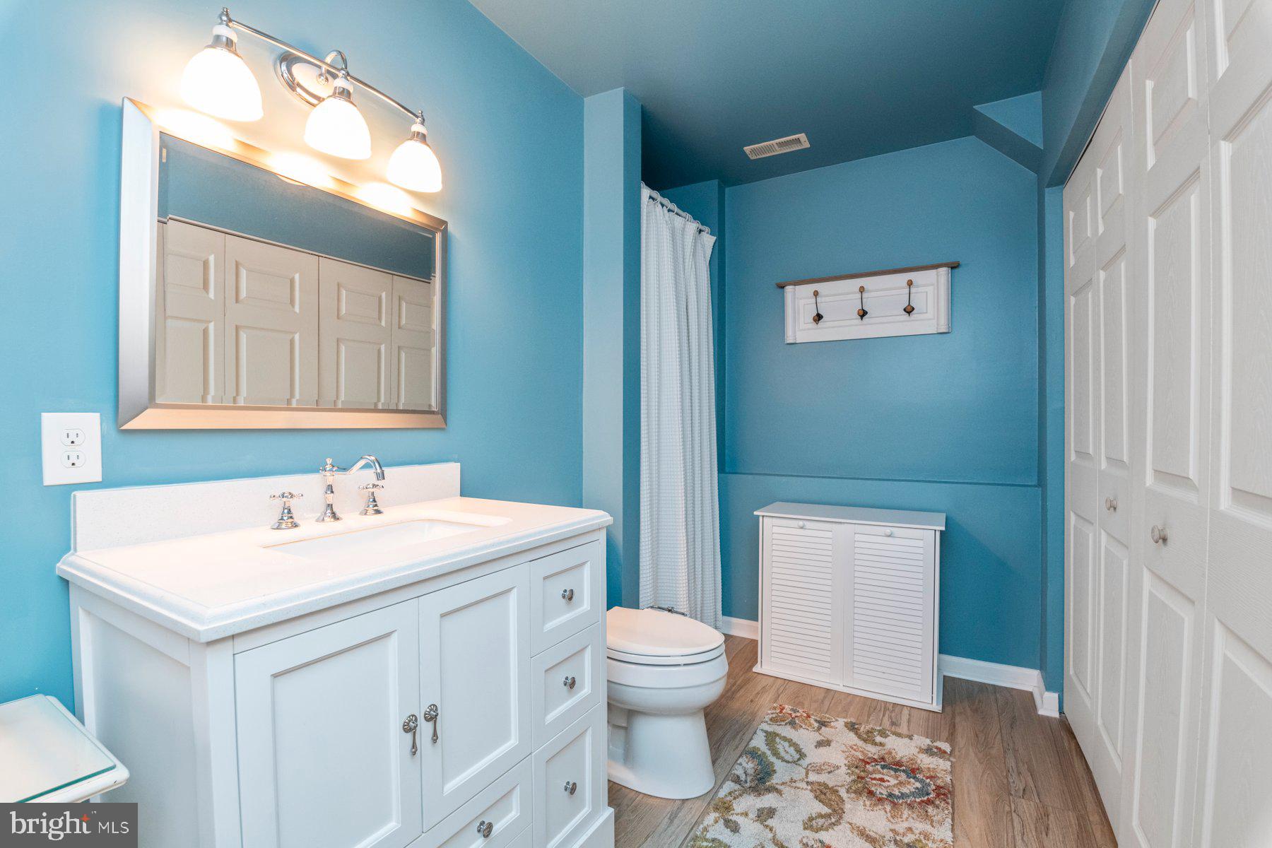 9078 Waltham Woods Road Baltimore, MD 21234 - Photo 23 of 38 Lower level - bathroom w/ washer & dryer in closet