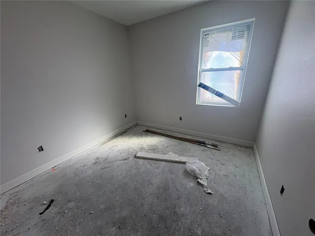 a view of a hallway with windows