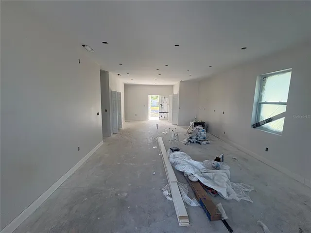 a living room with a couch and a table