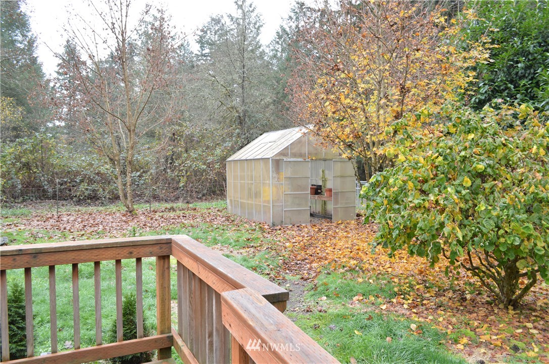 7370 Bordeaux Road Southwest Olympia, WA 98512 - Photo 25 of 25 a balcony with trees in front of it