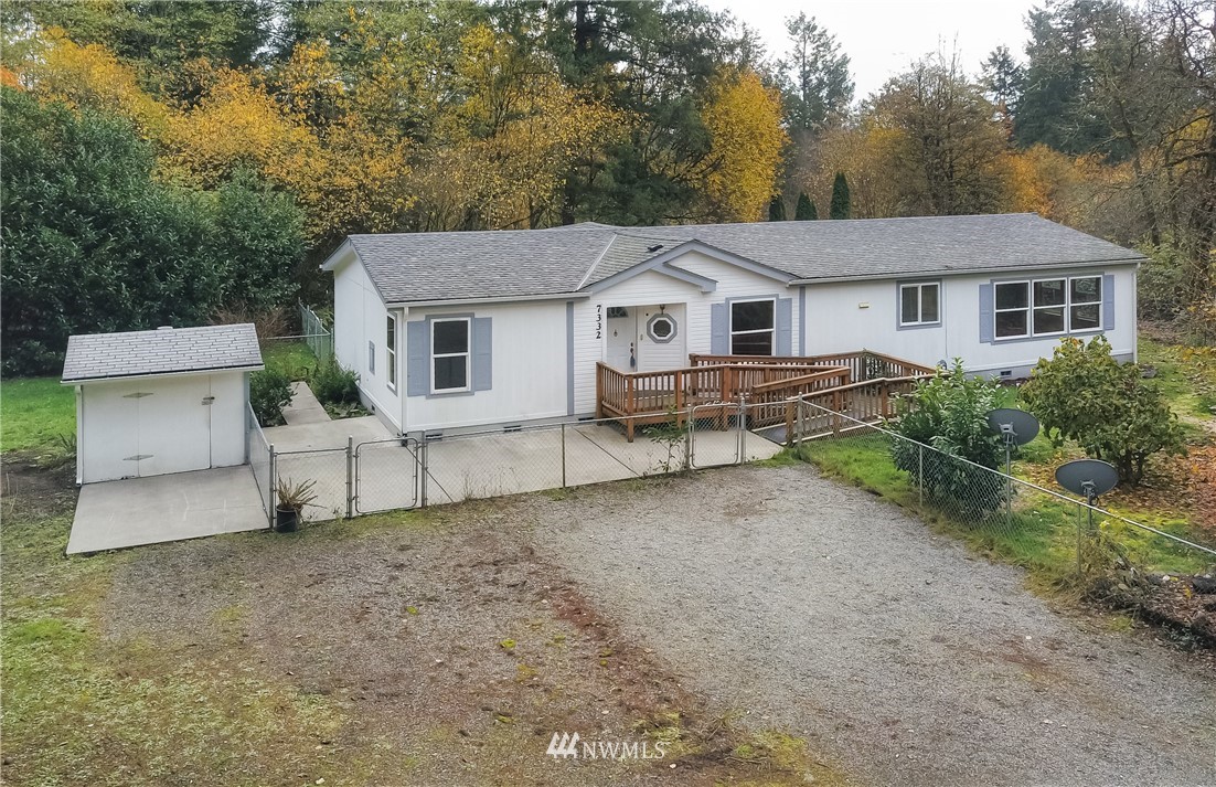 7370 Bordeaux Road Southwest Olympia, WA 98512 - Photo 6 of 25 front view of a house with a yard