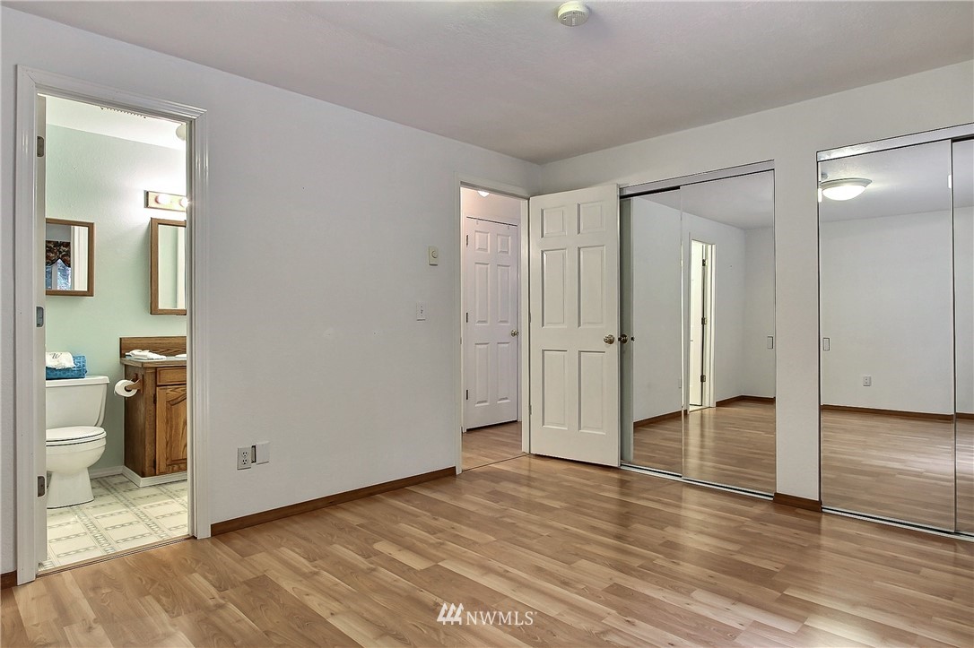7370 Bordeaux Road Southwest Olympia, WA 98512 - Photo 10 of 25 a view of empty room with wooden floor