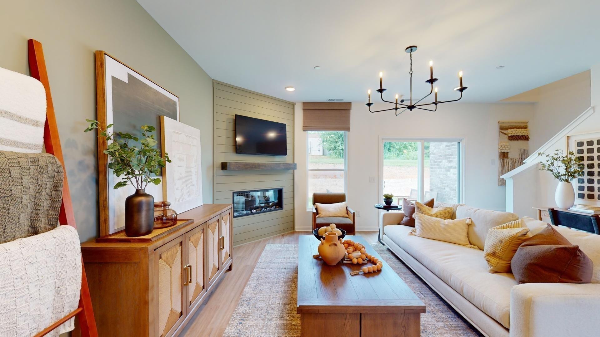 7112 Mapleside Lane Fairview, TN 37062 - Photo 24 of 49 a living room with fireplace furniture and a flat screen tv
