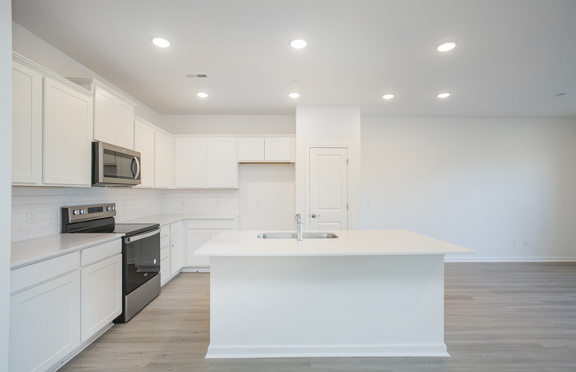 7112 Mapleside Lane Fairview, TN 37062 - Photo 5 of 49 a kitchen with a sink stainless steel appliances and cabinets
