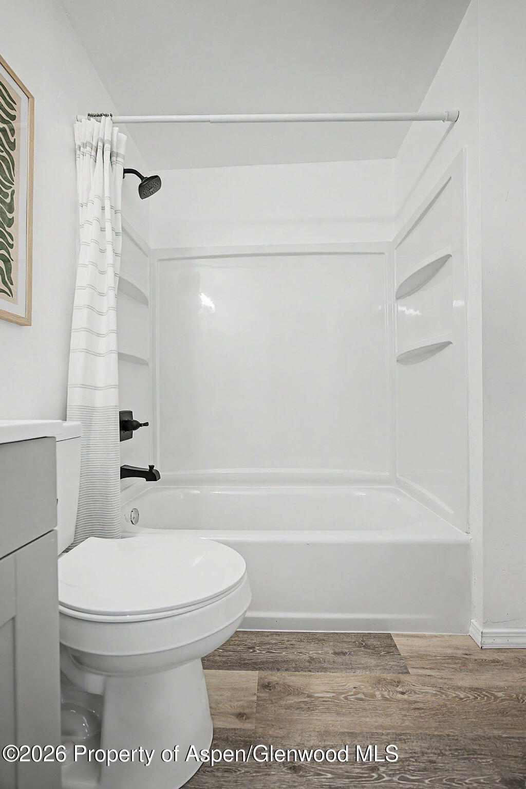 54 South Ranney Street Craig, CO 81625 - Photo 14 of 32 a bathroom with a toilet and a shower