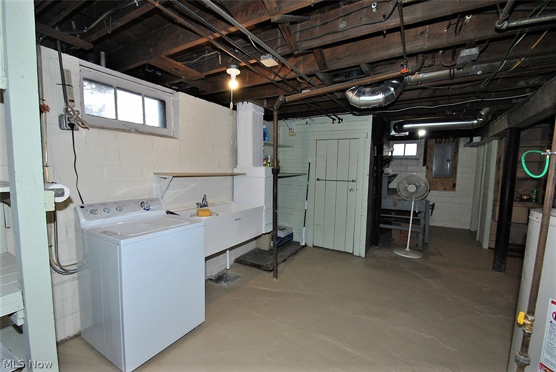 2456 Eaton Road Cleveland, OH 44118 - Photo 25 of 30 Washer with dual sink utility. Laundry shute drops on the other side of the tub.