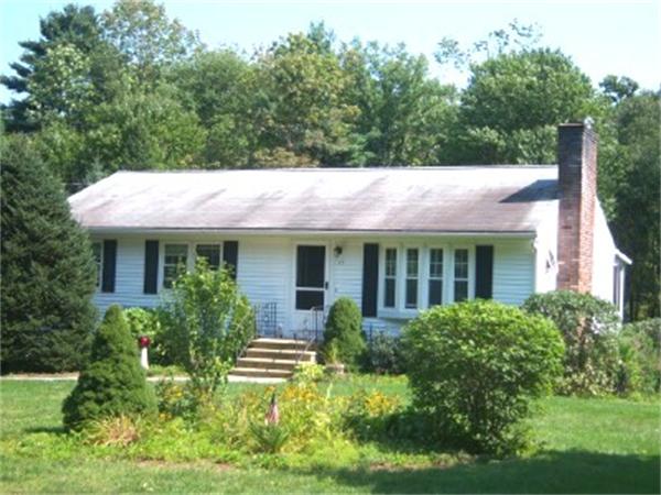 15 Squareshire Road Sterling, MA 01564 - Photo 2 of 30 a view of a white house with a big yard and potted plants