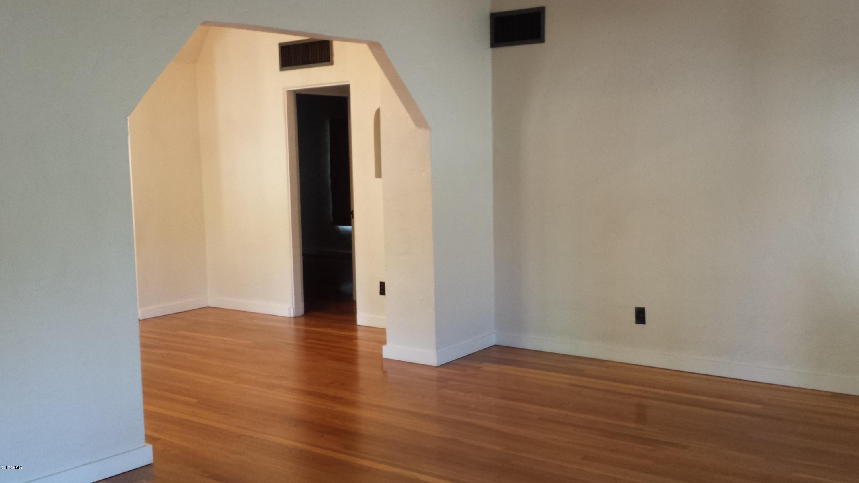 1539 East Cheery Lynn Road Phoenix, AZ 85014 - Photo 3 of 13 1539 Living room into dining room 1