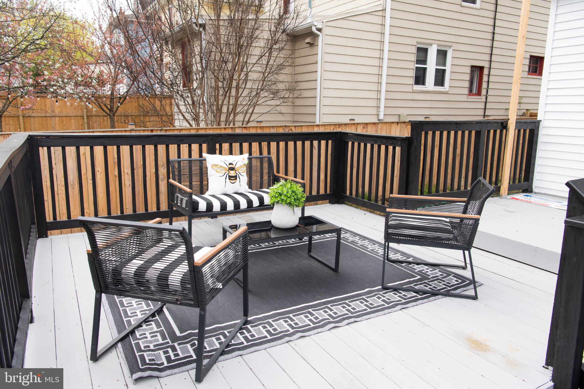 3309 22nd Street Northeast Washington, DC 20018 - Photo 16 of 36 a view of a two chairs on the deck