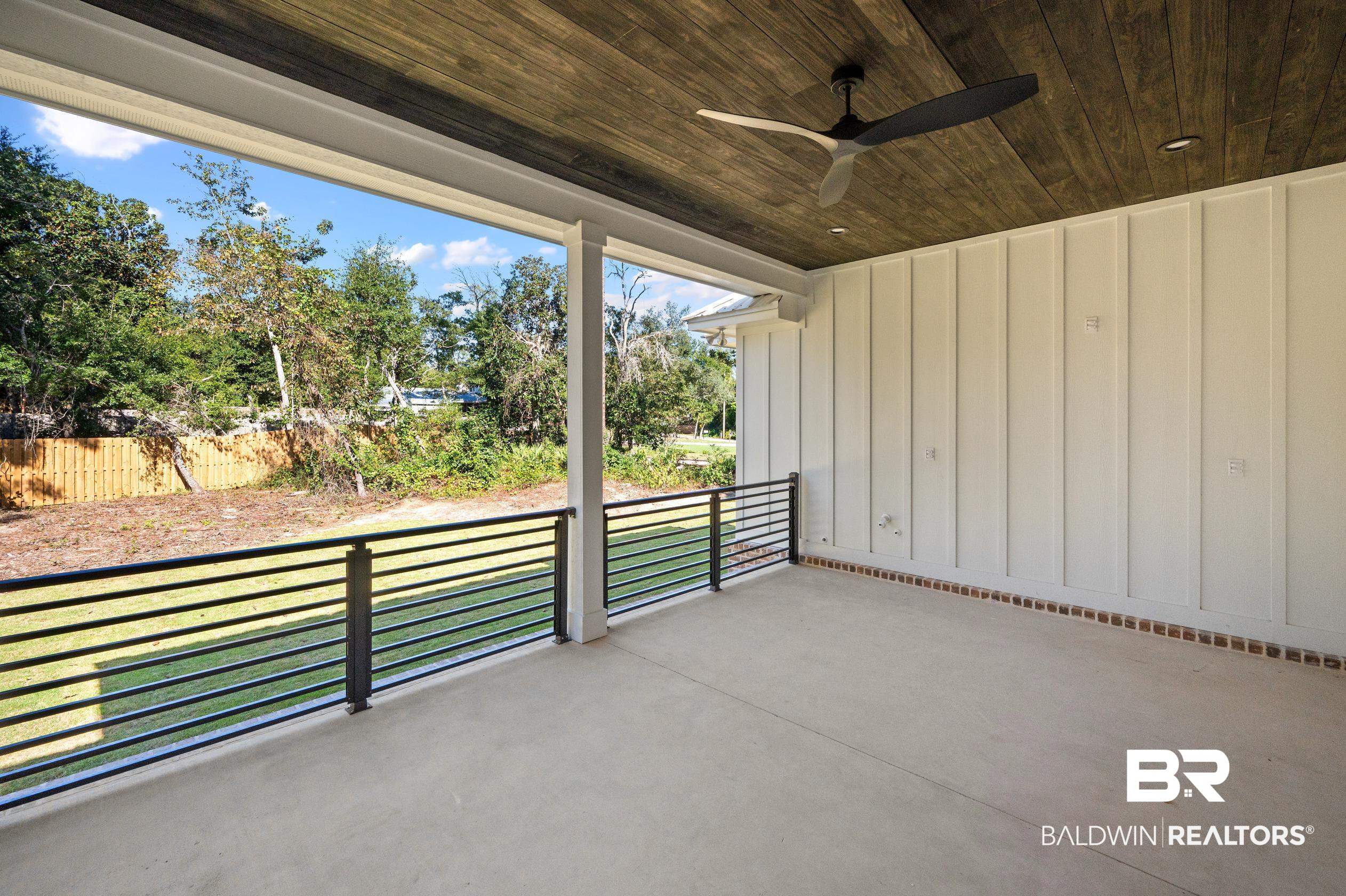 28889 Canal Road Orange Beach, AL 36561 - Photo 45 of 55 View of patio / terrace with ceiling fan