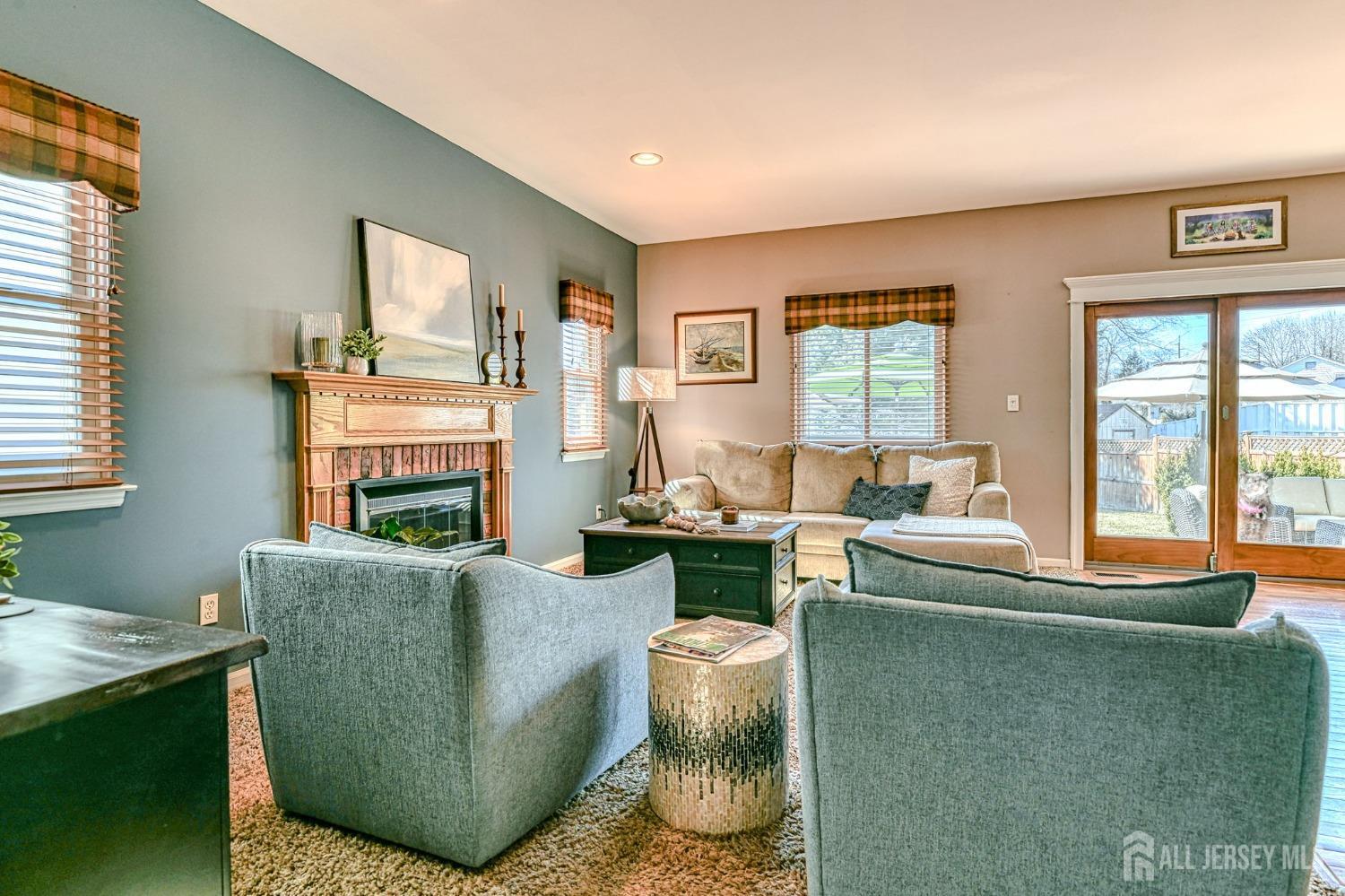 10 Graulich Drive Milltown, NJ 08850 - Photo 13 of 40 a living room with furniture and a large window
