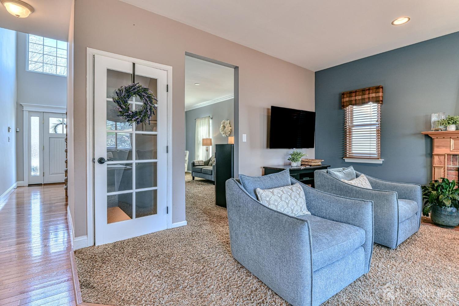 10 Graulich Drive Milltown, NJ 08850 - Photo 14 of 40 a living room with furniture and a flat screen tv