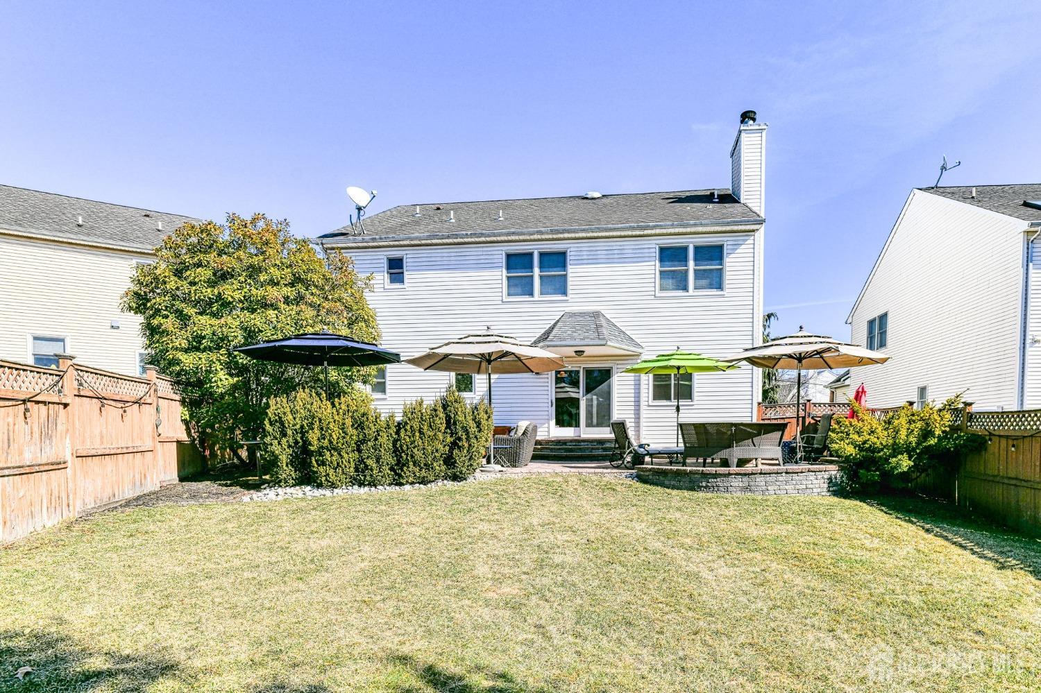 10 Graulich Drive Milltown, NJ 08850 - Photo 2 of 40 a front view of a house with a yard