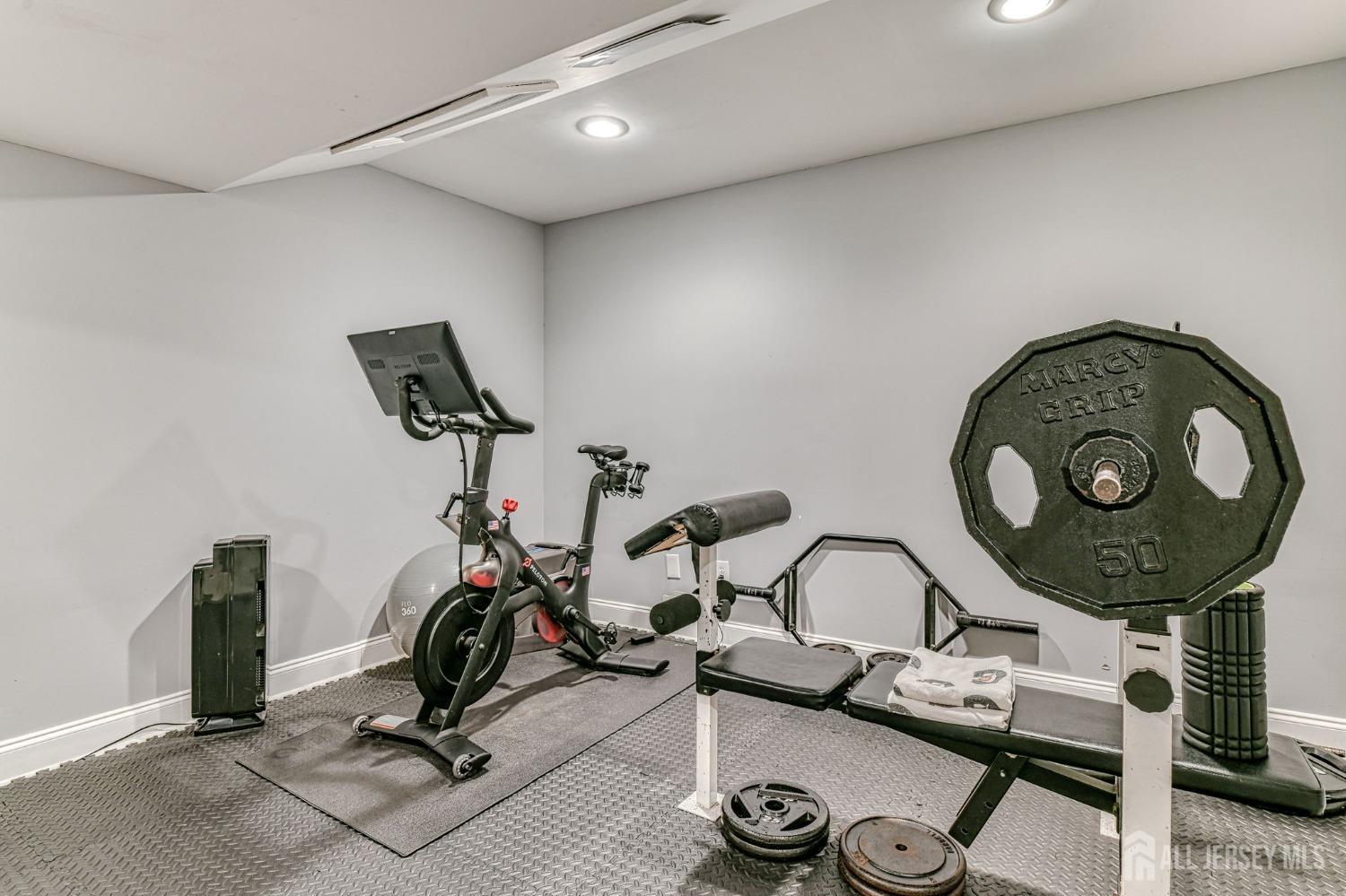 10 Graulich Drive Milltown, NJ 08850 - Photo 23 of 40 a view of a room with gym equipment