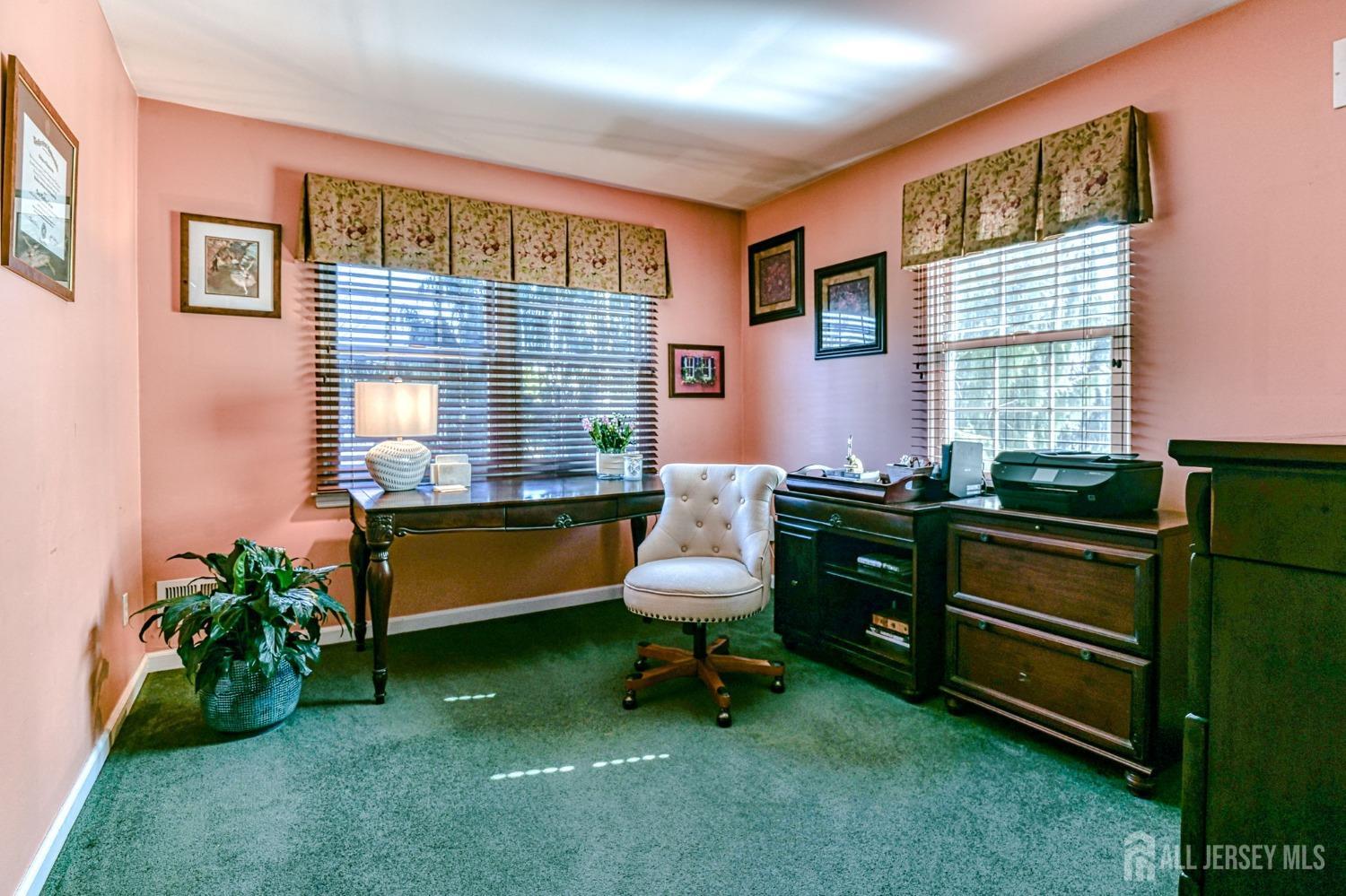 10 Graulich Drive Milltown, NJ 08850 - Photo 33 of 40 a room with furniture and a window