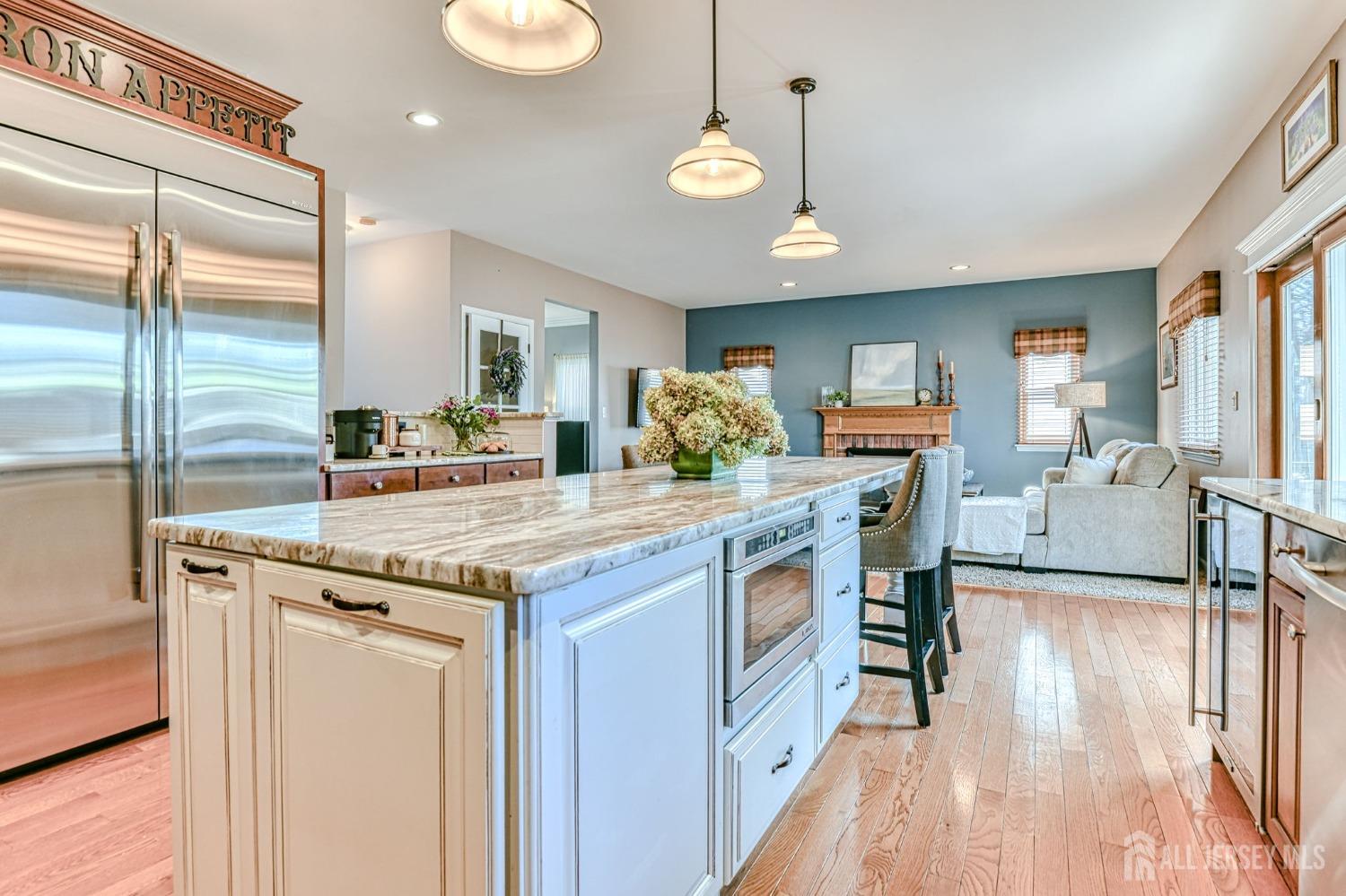10 Graulich Drive Milltown, NJ 08850 - Photo 8 of 40 a kitchen with granite countertop a stove and cabinets