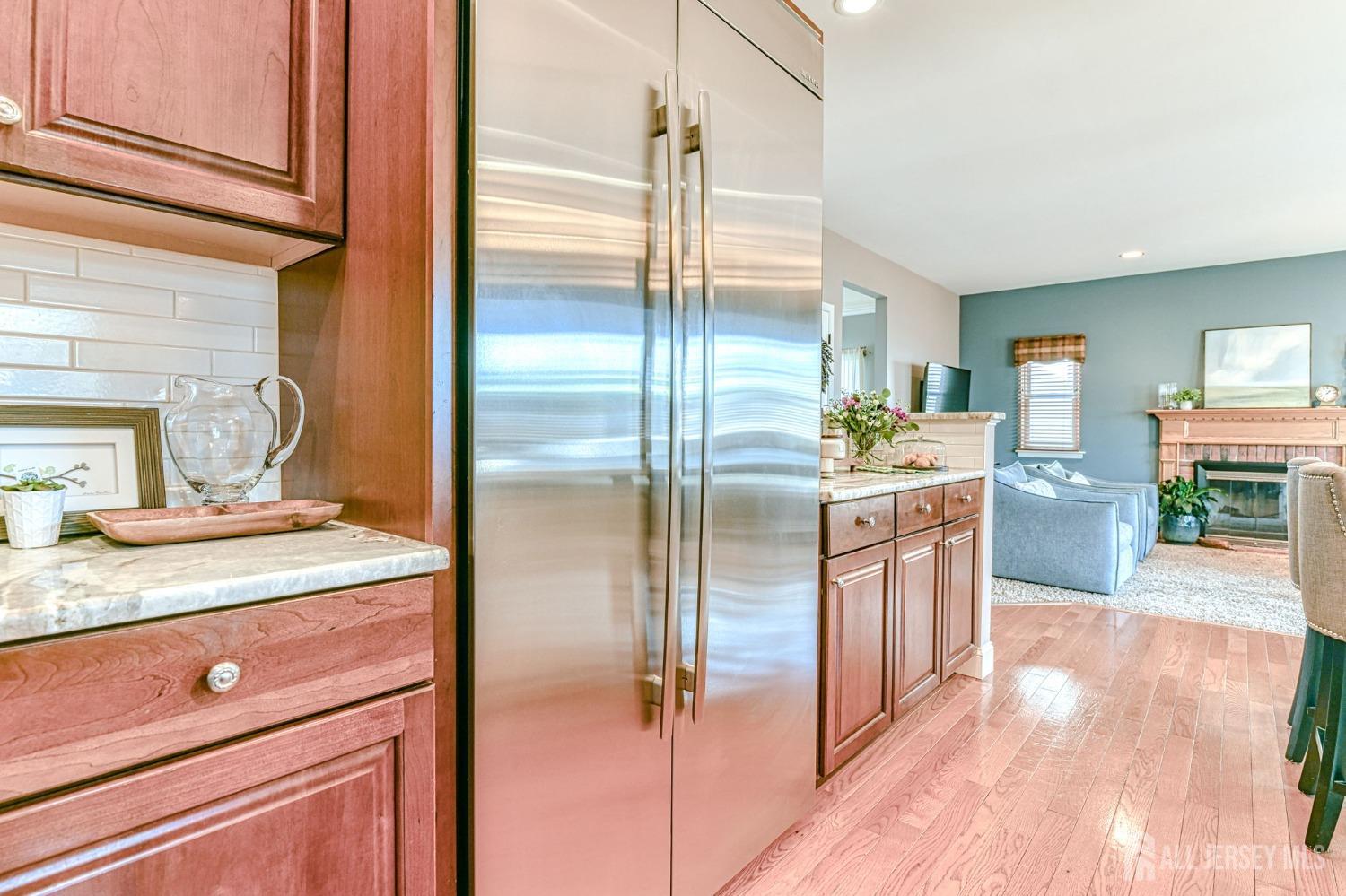 10 Graulich Drive Milltown, NJ 08850 - Photo 10 of 40 a kitchen with stainless steel appliances granite countertop a refrigerator a sink and a stove