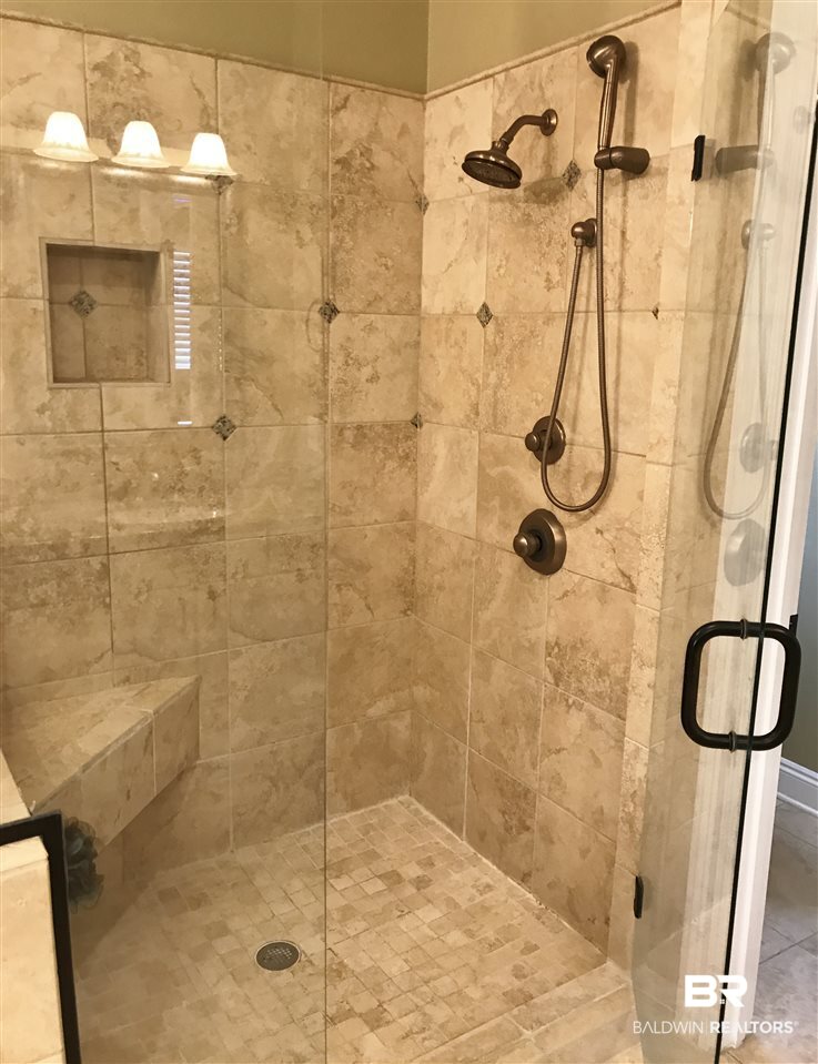 30840 West Ono North Loop Orange Beach, AL 36561 - Photo 29 of 49 With glass surround, seat & top to bottom tile