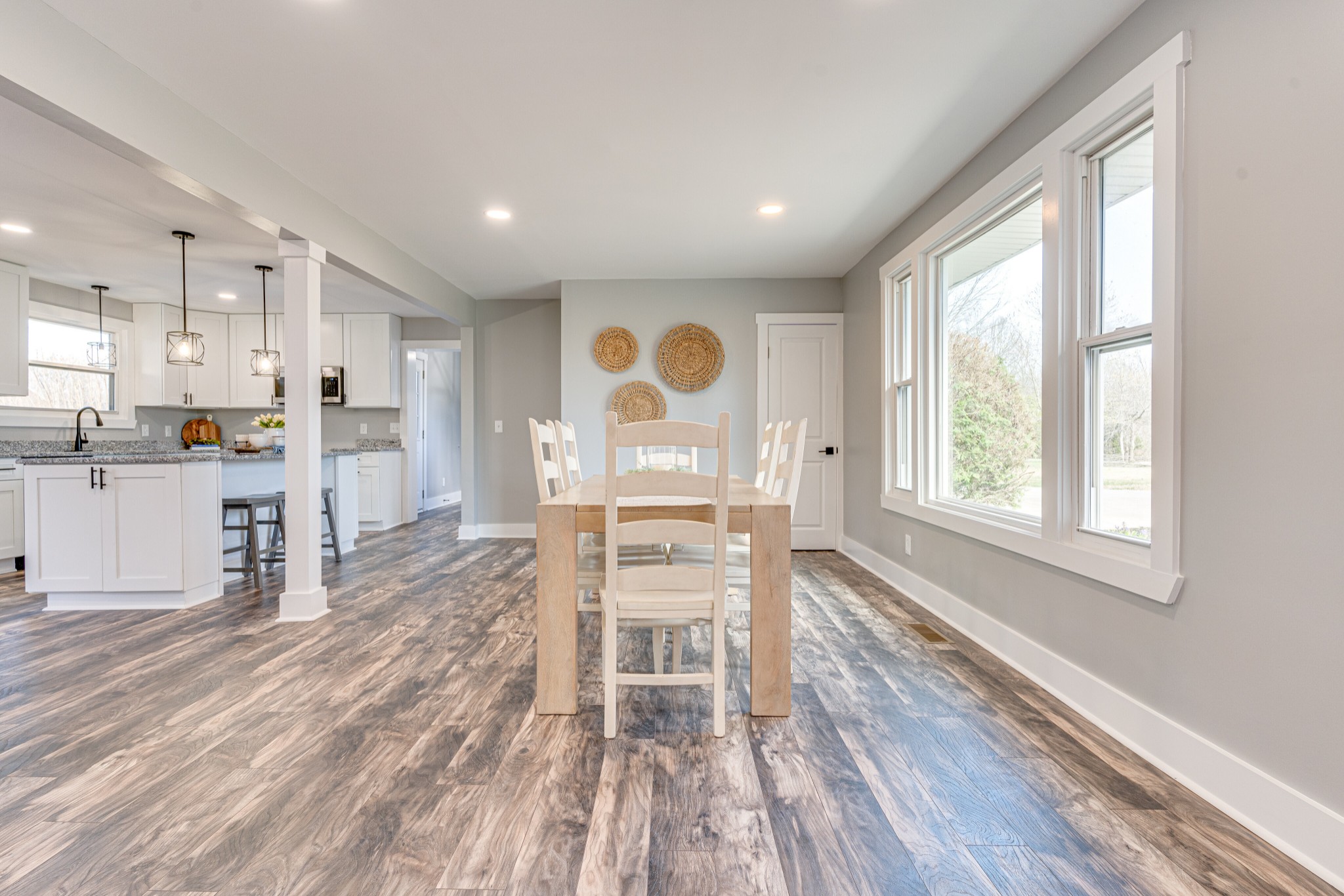7302 Henry Road Fairview, TN 37062 - Photo 13 of 69 a living room with stainless steel appliances furniture wooden floor and a large window