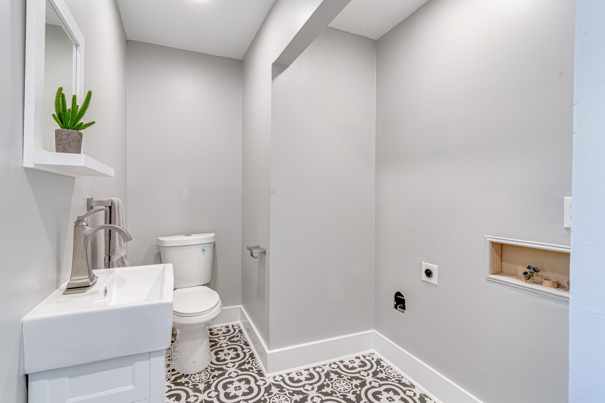 7302 Henry Road Fairview, TN 37062 - Photo 20 of 69 a bathroom with a toilet and a sink