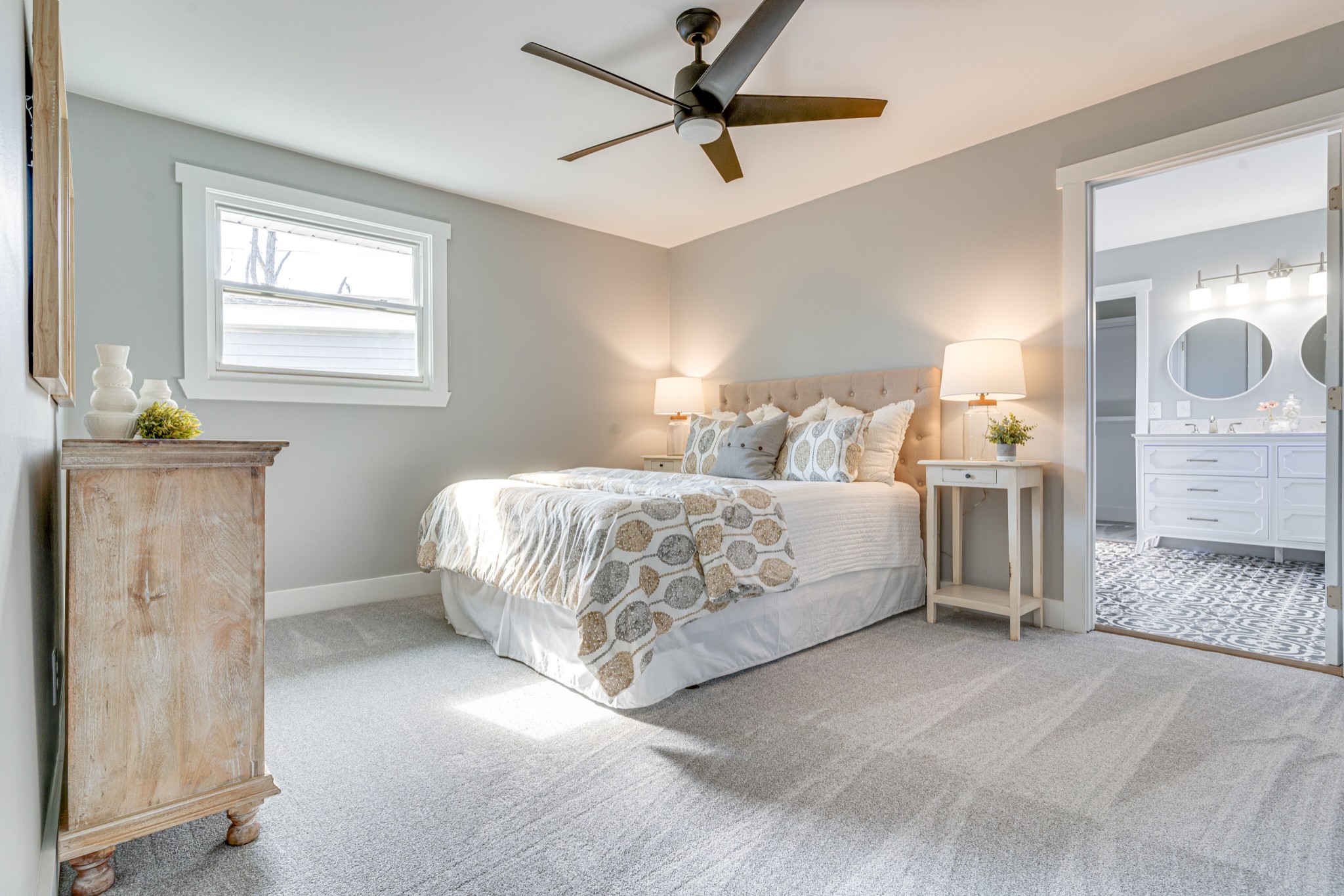 7302 Henry Road Fairview, TN 37062 - Photo 23 of 69 a bedroom with a bed and window with lamp