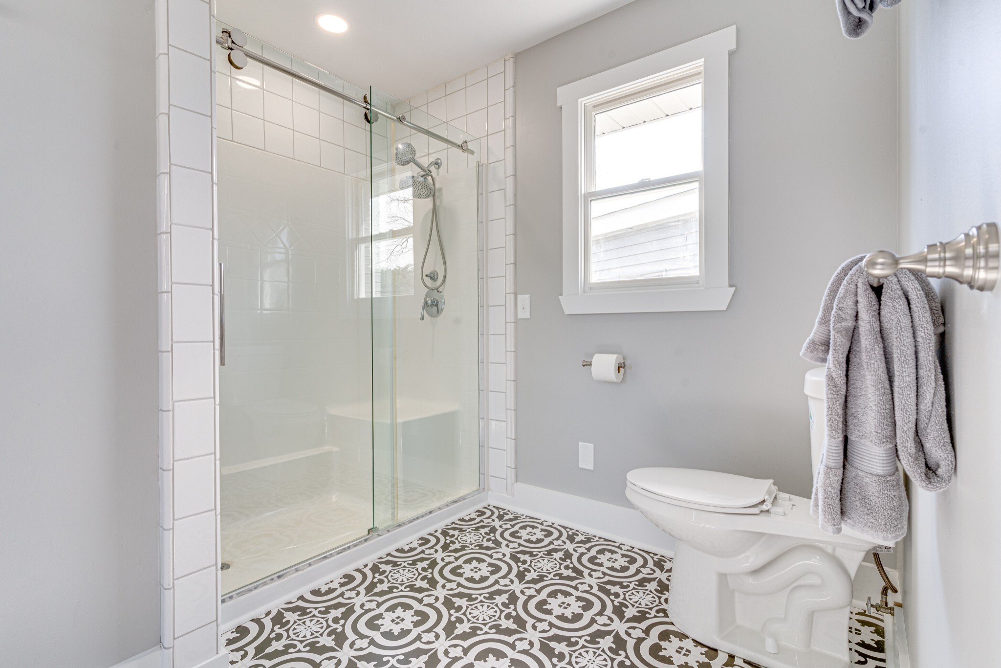 7302 Henry Road Fairview, TN 37062 - Photo 27 of 69 a bathroom with a shower and a toilet