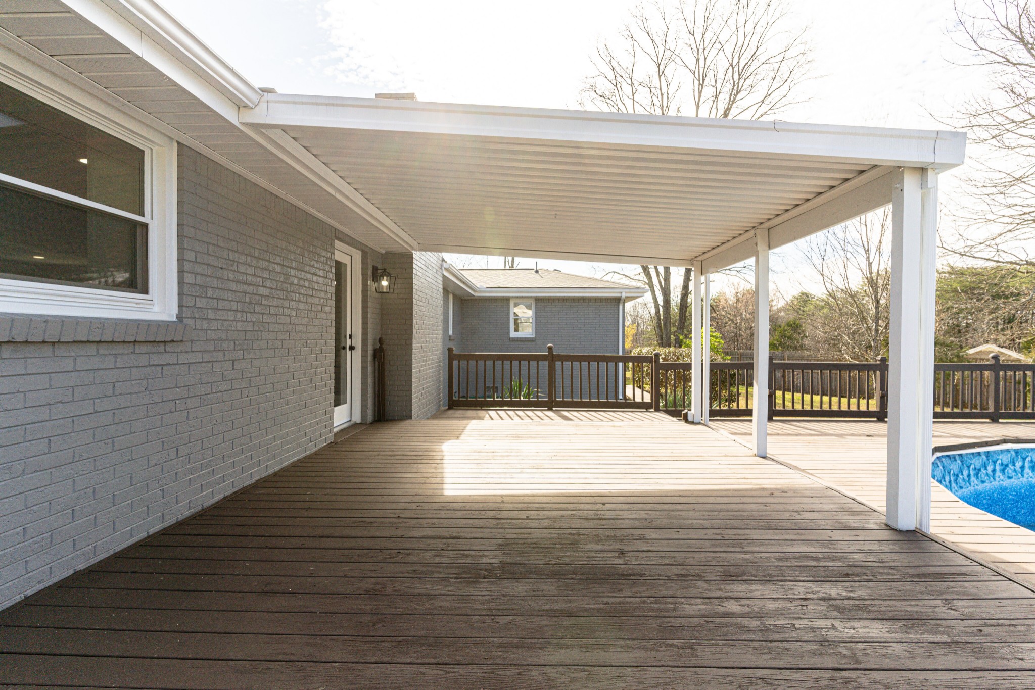 7302 Henry Road Fairview, TN 37062 - Photo 32 of 69 a view of an empty room with wooden floor and fence