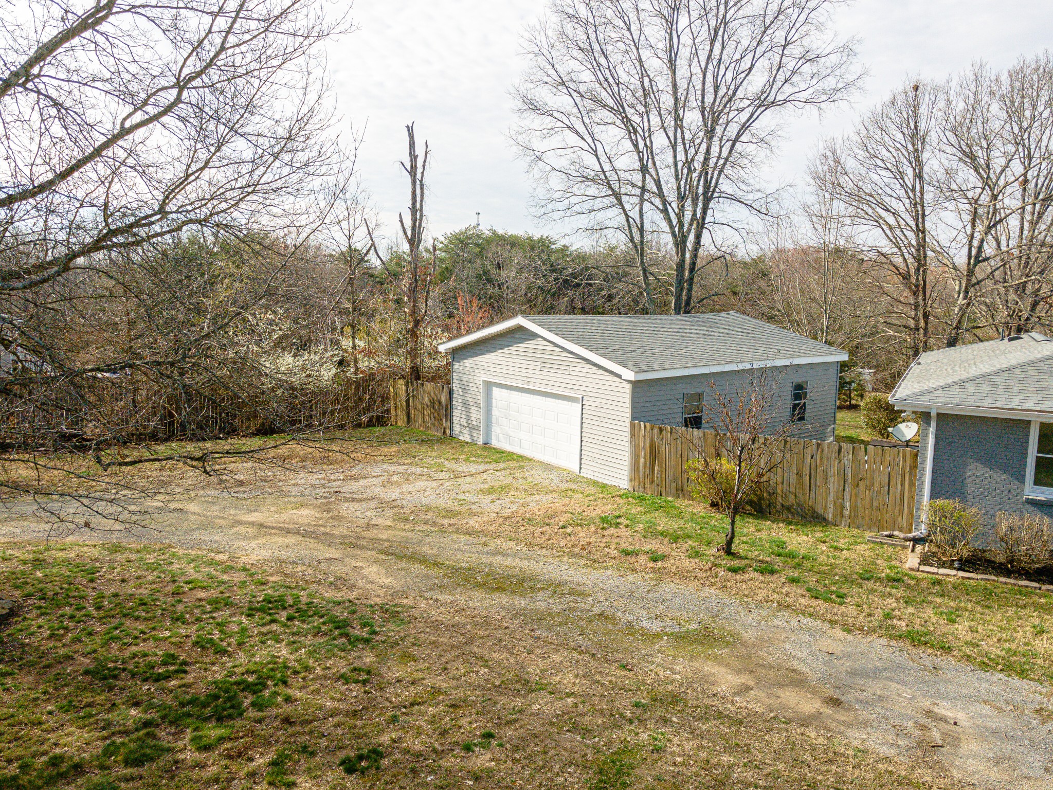 7302 Henry Road Fairview, TN 37062 - Photo 45 of 69 a house that has a tree in front of it