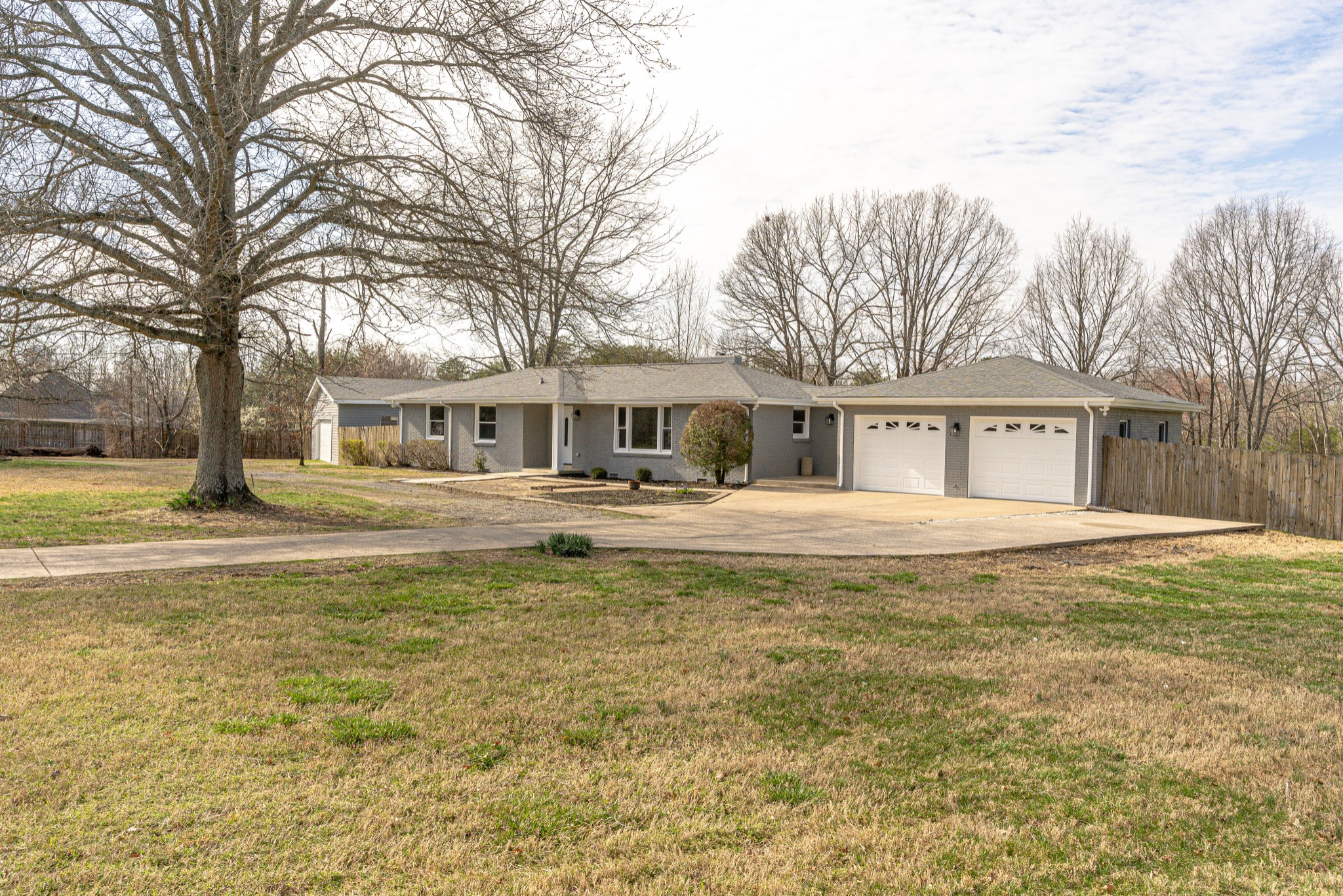 7302 Henry Road Fairview, TN 37062 - Photo 6 of 69 a house view with swimming pool in front of it