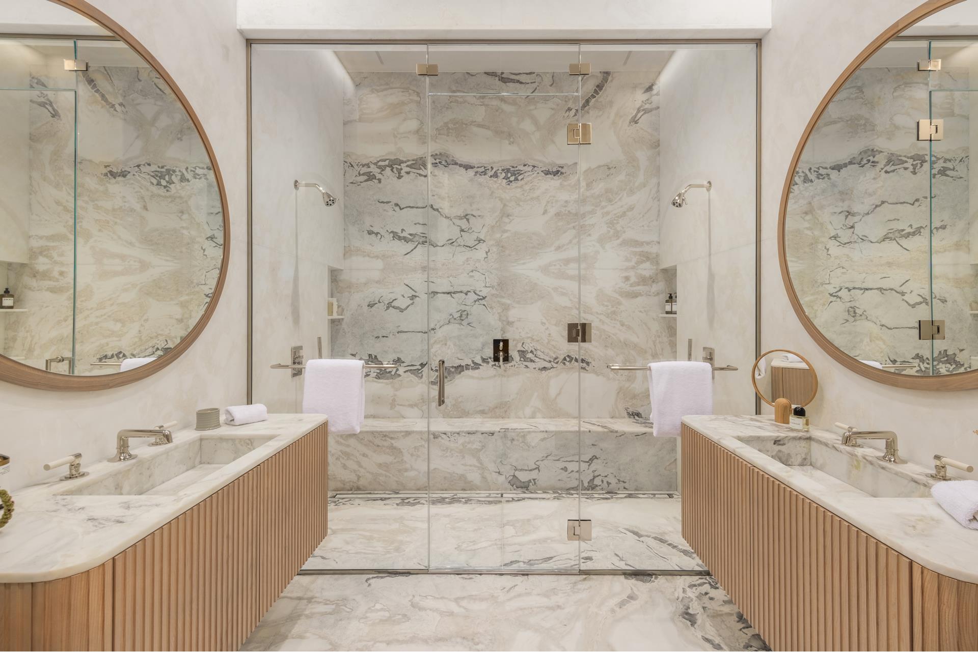 85 Worth Street, Unit 5 Manhattan, NY 10013 - Photo 5 of 20 a bathroom with a tub sink and mirror