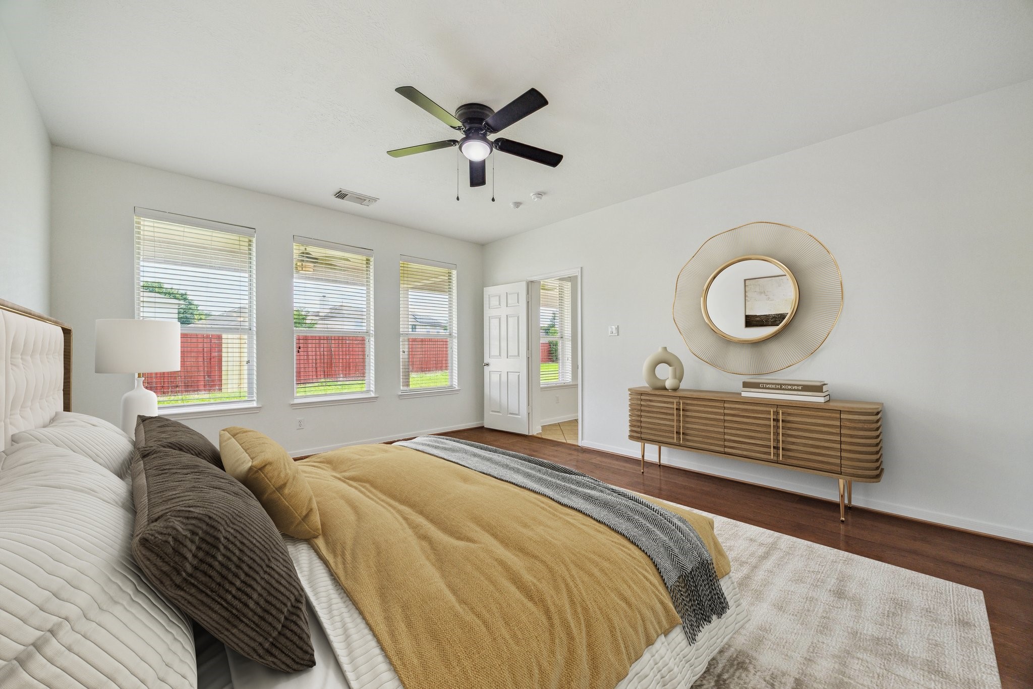 26402 Larkspur Ridge Drive Katy, TX 77494 - Photo 15 of 34 a bedroom with a bed and a dresser next to a window