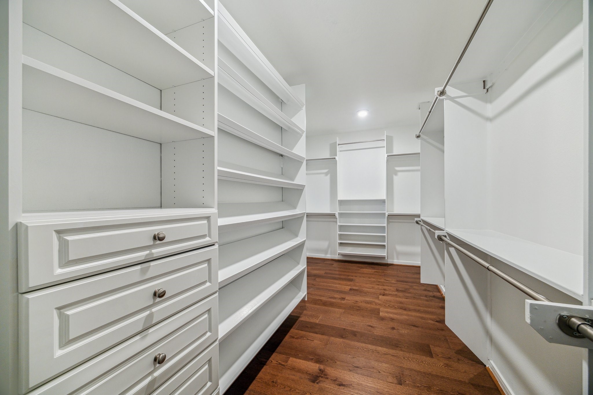 26402 Larkspur Ridge Drive Katy, TX 77494 - Photo 19 of 34 a view of an empty walk in closet