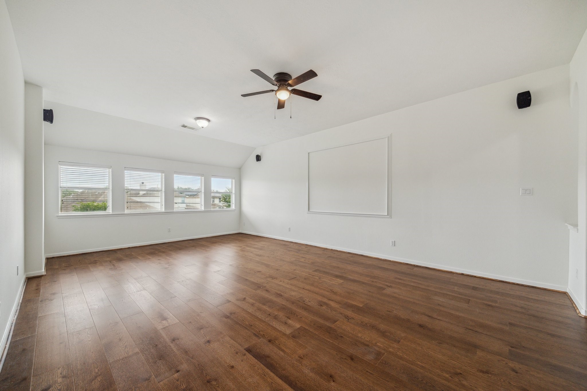 26402 Larkspur Ridge Drive Katy, TX 77494 - Photo 20 of 34 wooden floor in an empty room with a window