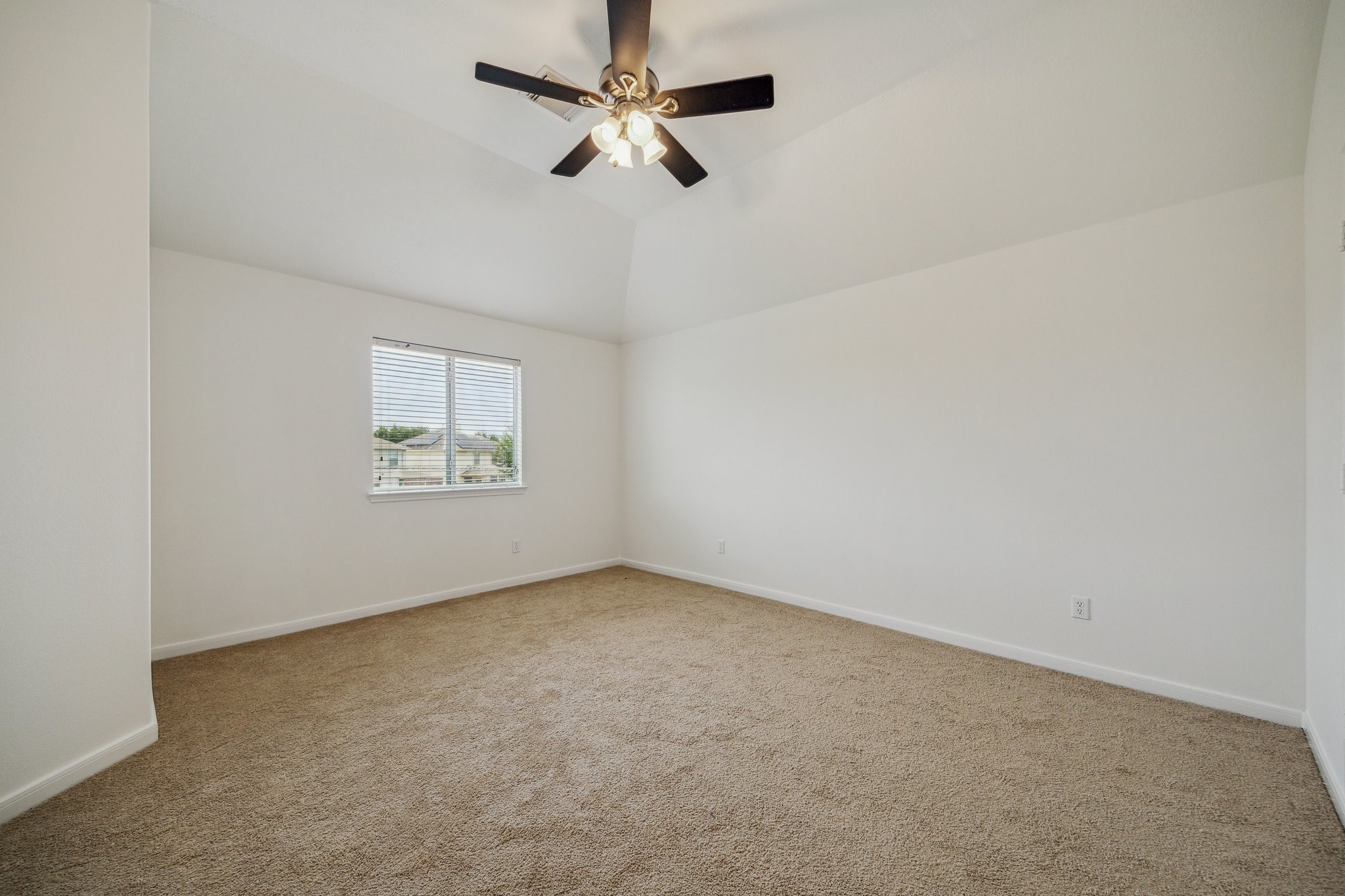 26402 Larkspur Ridge Drive Katy, TX 77494 - Photo 23 of 34 an empty room with a window and a fan